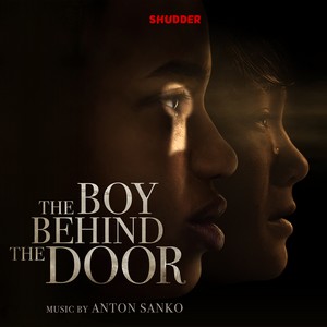 cover boy behind door